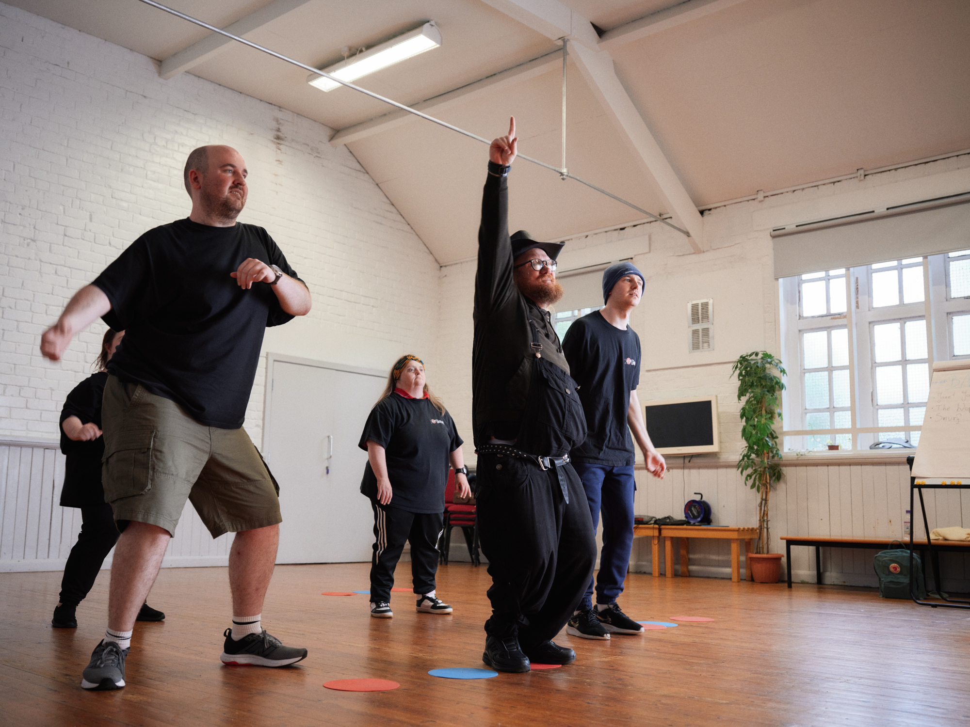 Adult group dancing in a hall
